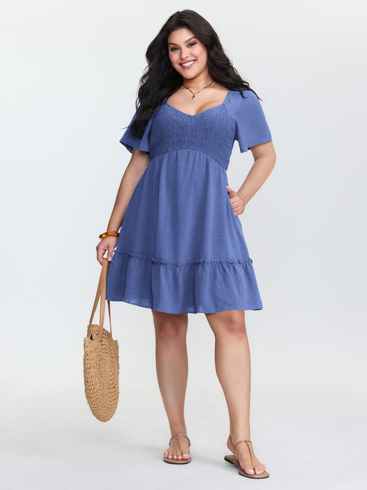Shirred Bodice Ruffle Hem Flowy Mini Dress